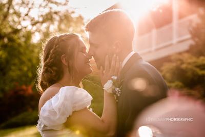 Newlywed couple sharing a kiss